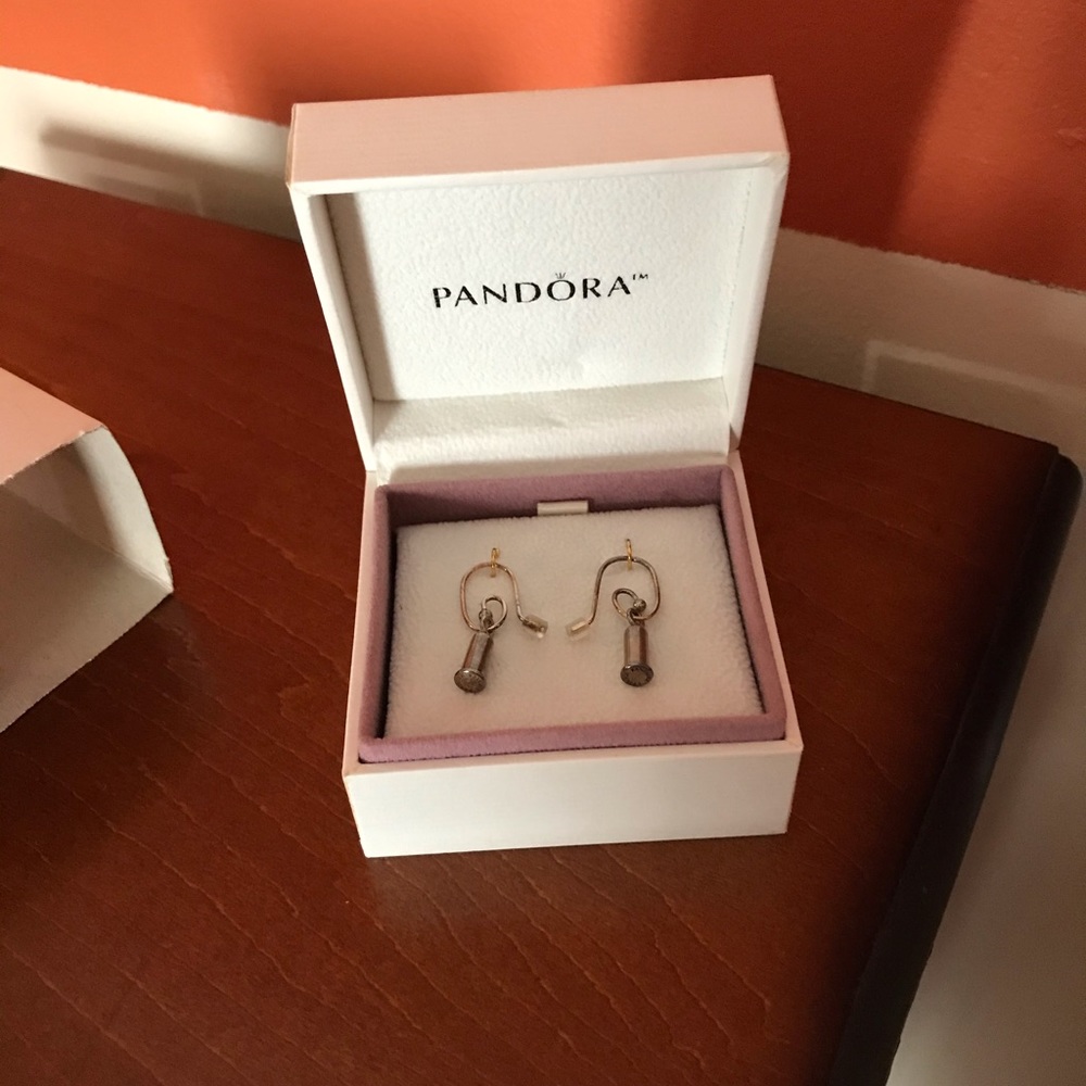 Never worn retired Pandora earring charm barrels